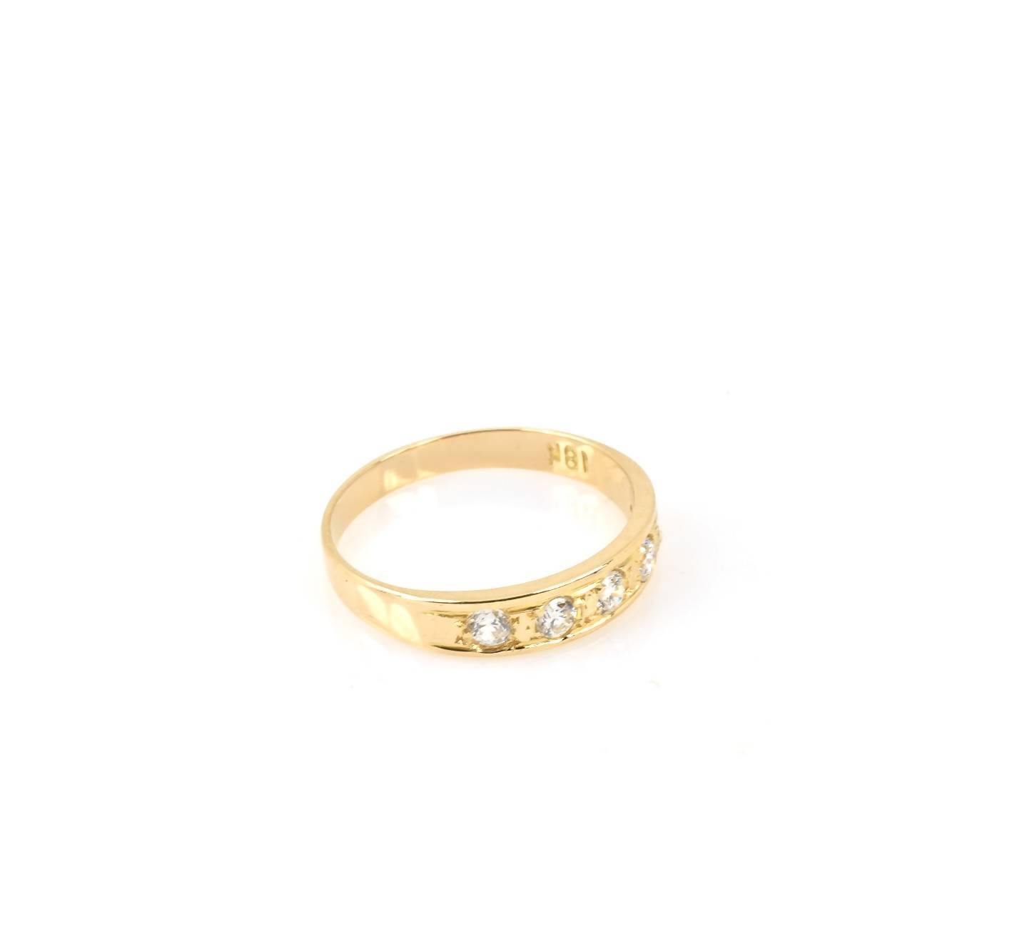 Anillo de oro para mujer 18k cintillo con cinco piedras blancas